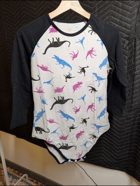 White Bodysuit with Black Trim and Pink & Blue Dino Prints